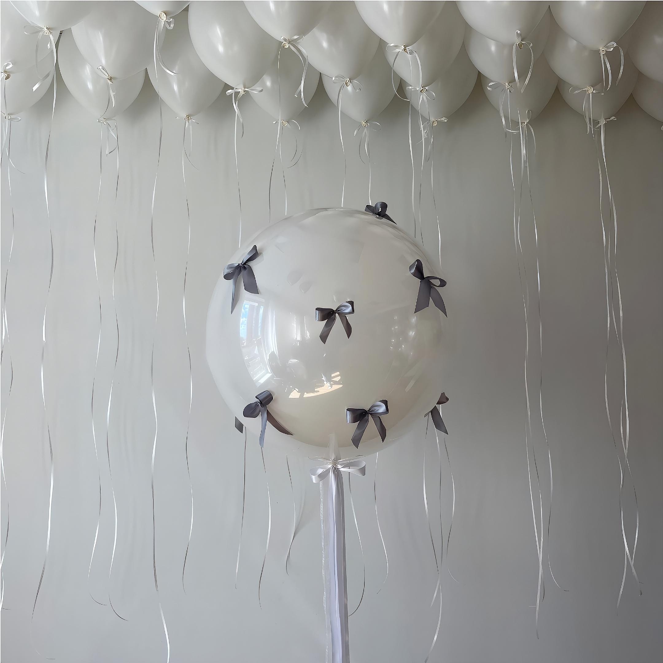 Silver Bow Balloons: DIY Coquette Party Decor